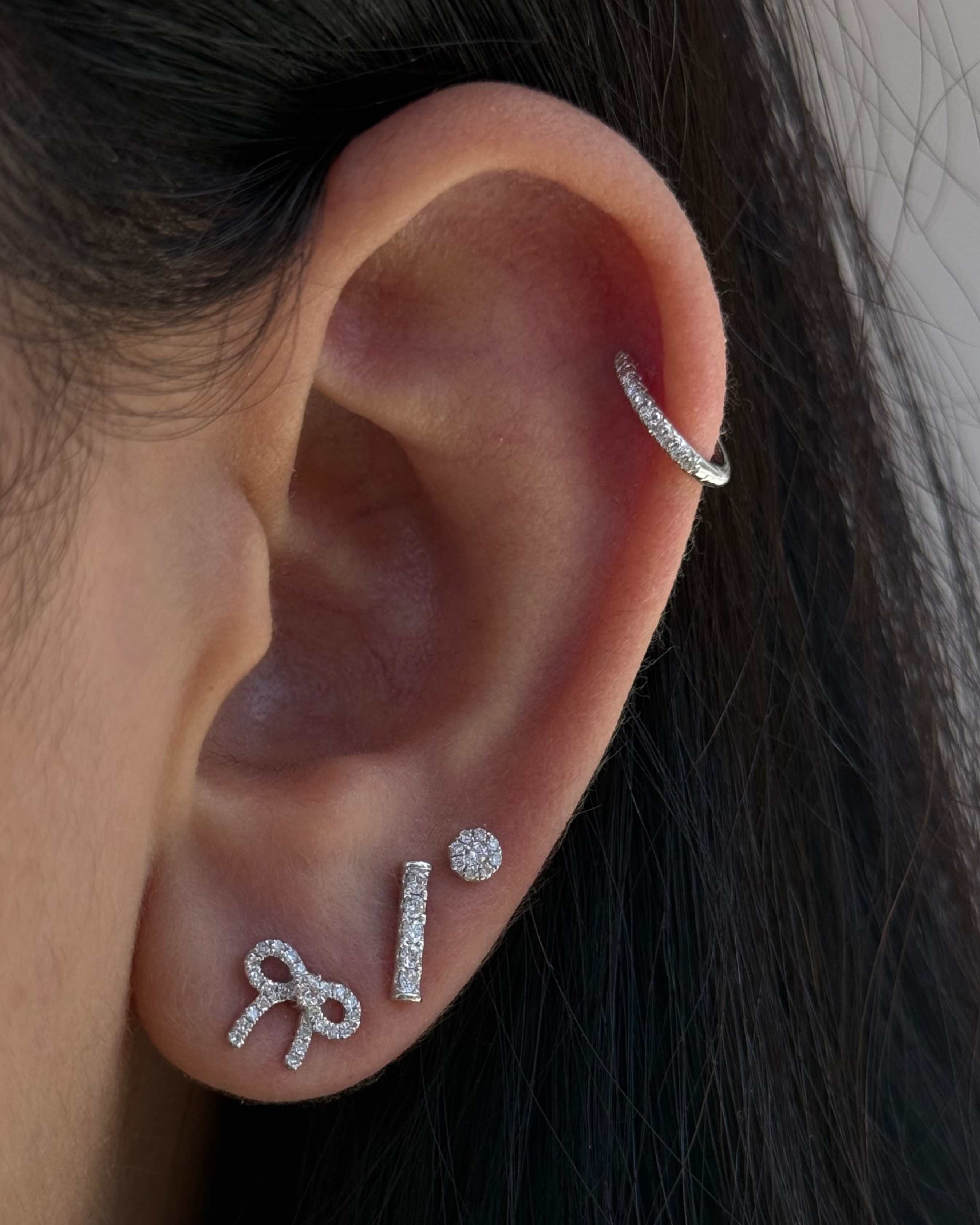 Diamond Bow Earrings with Center Stone