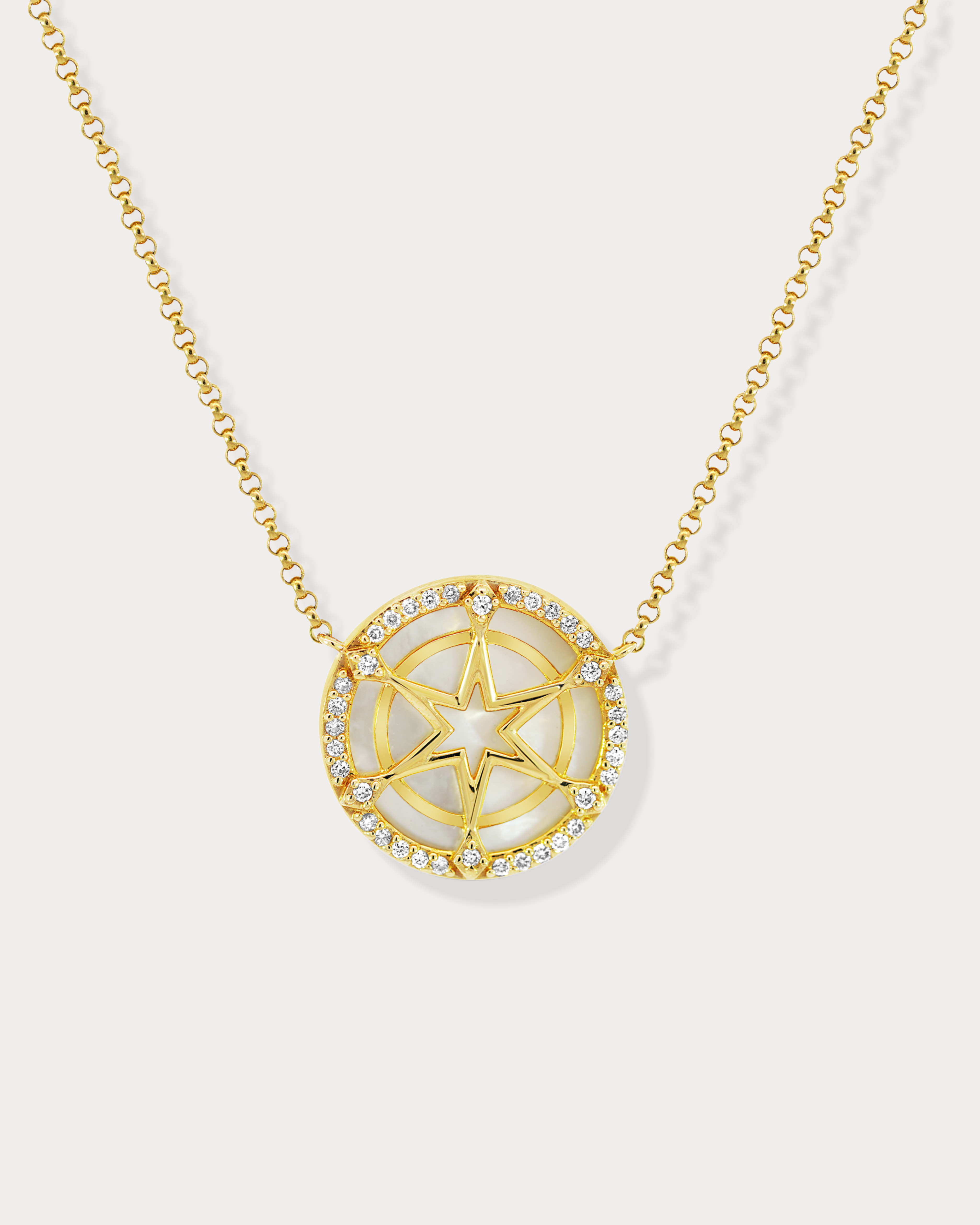 Cadran étoile en or et diamants avec pendentif incrusté de nacre