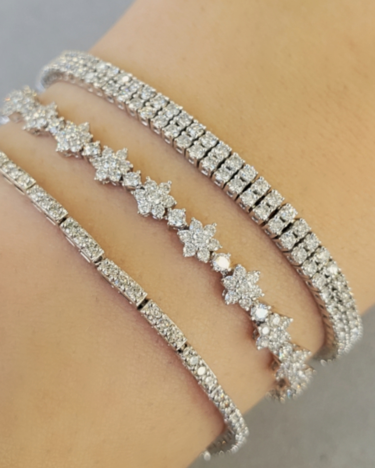 Double row lab diamond tennis bracelet on a model, showcasing timeless elegance and sustainable luxury.