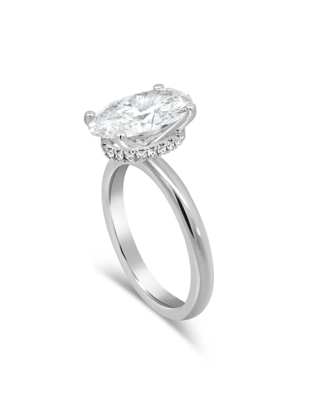 Oval Lab diamond engagement ring with hidden halo