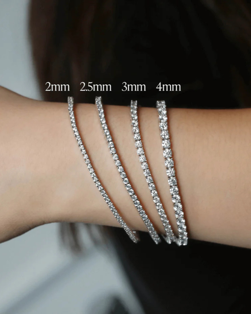 Classic LAB Bold Tennis Bracelet with 4 prong lab diamonds on model, blending timeless elegance and modern craftsmanship.