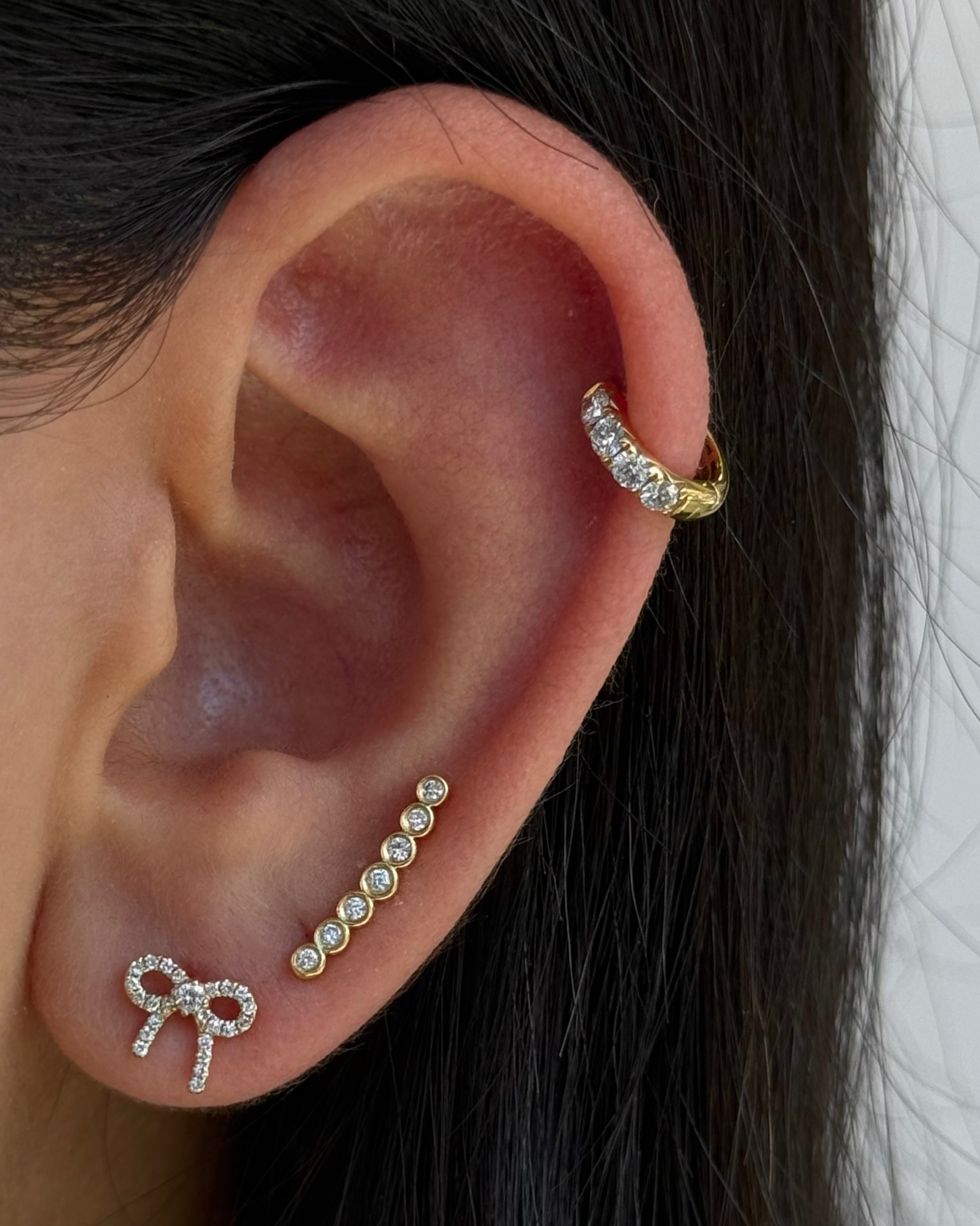 Diamond Bow Earrings with Center Stone