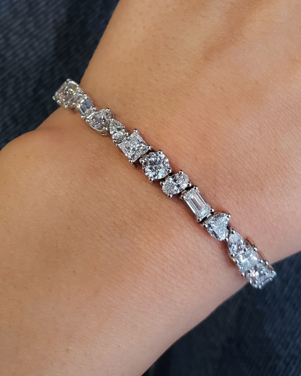 Lab Diamond Tennis Bracelet with mixed fancy shapes on a model, featuring unique designs and sustainable elegance.