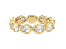Load image into Gallery viewer, Pear shape bezel eternity band with lab diamonds on white background, showcasing timeless elegance and sustainable luxury.
